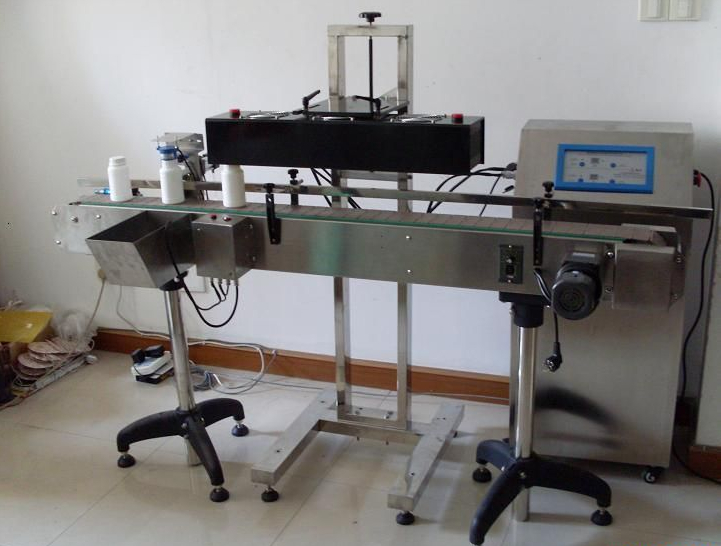 induction sealing machine קו אינדוקציה אוטומטי.jpg