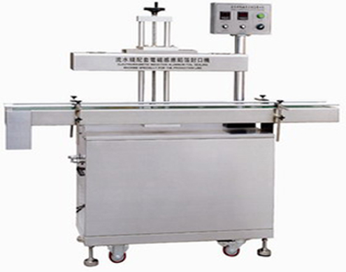 automatic aluminum foil sealing machine מכונת איטום נייר אינדוקציה.JPG