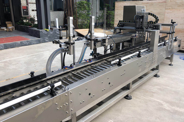 מכונת כיסוי דלי שמן למילוי שמן.jpg