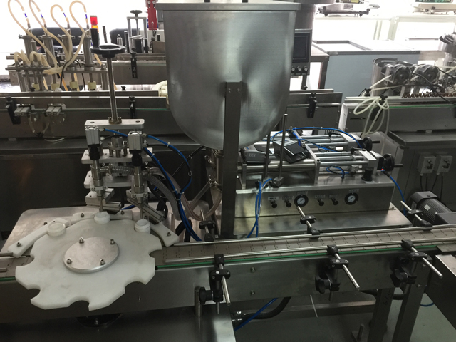 מכונת מילוי שתי צנצנות.jpg