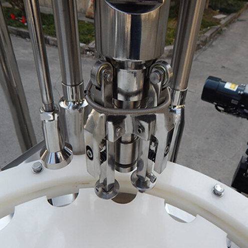 ropp capping heads for vial capper בקבוקים ROPP cappping equipment.jpg