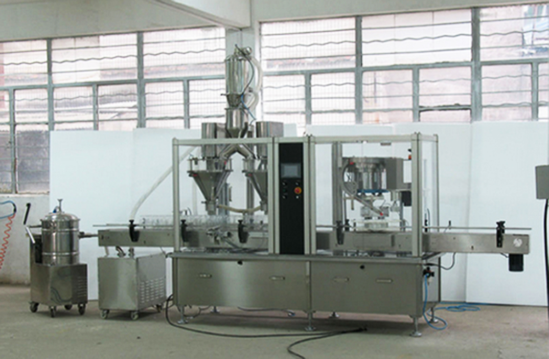 automatic powder filling line מכונת אריזת אבקה עם ראשים כפולים.jpg