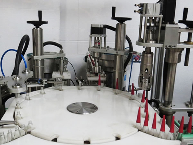 מילוי לק rotary capping.jpg