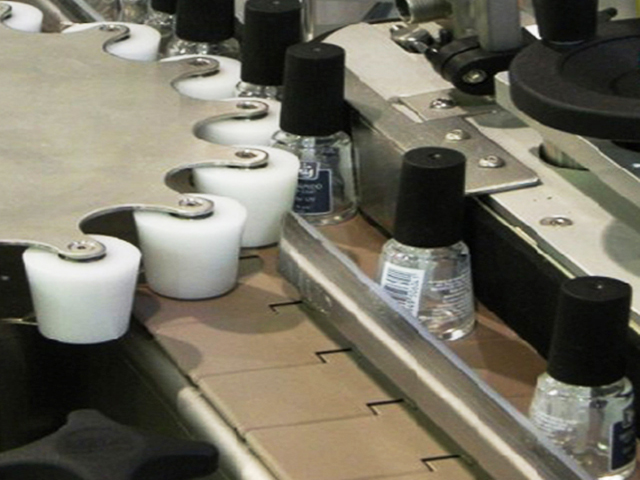 בקבוקים עם גלגל כוכב סיבובי לתיוג.jpg