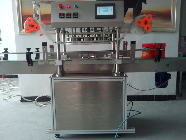 automatic three heads jars sealing equipment מכונת איטום צנצנות.jpg