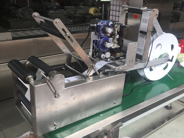 semi automatic bottle labeling equipment מכונת תיוג בקבוקים manual.jpg