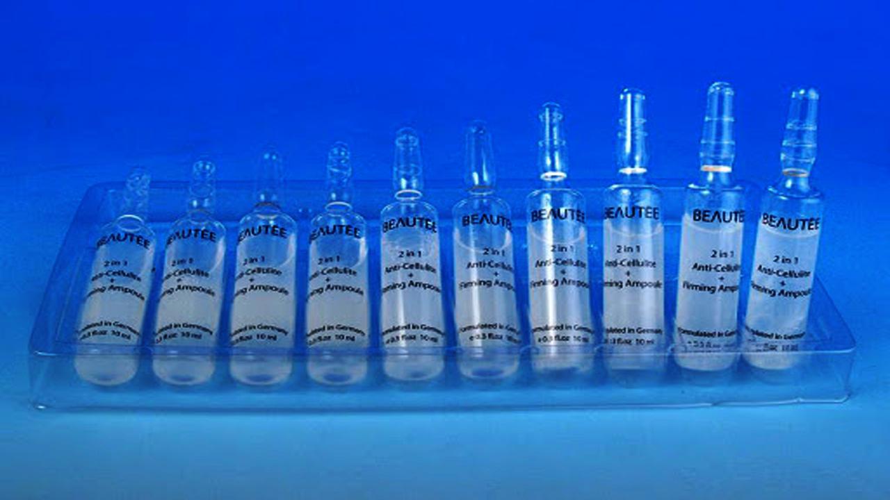 liquid solution bottles labeling machine samples final products אמפולה bottles.jpg