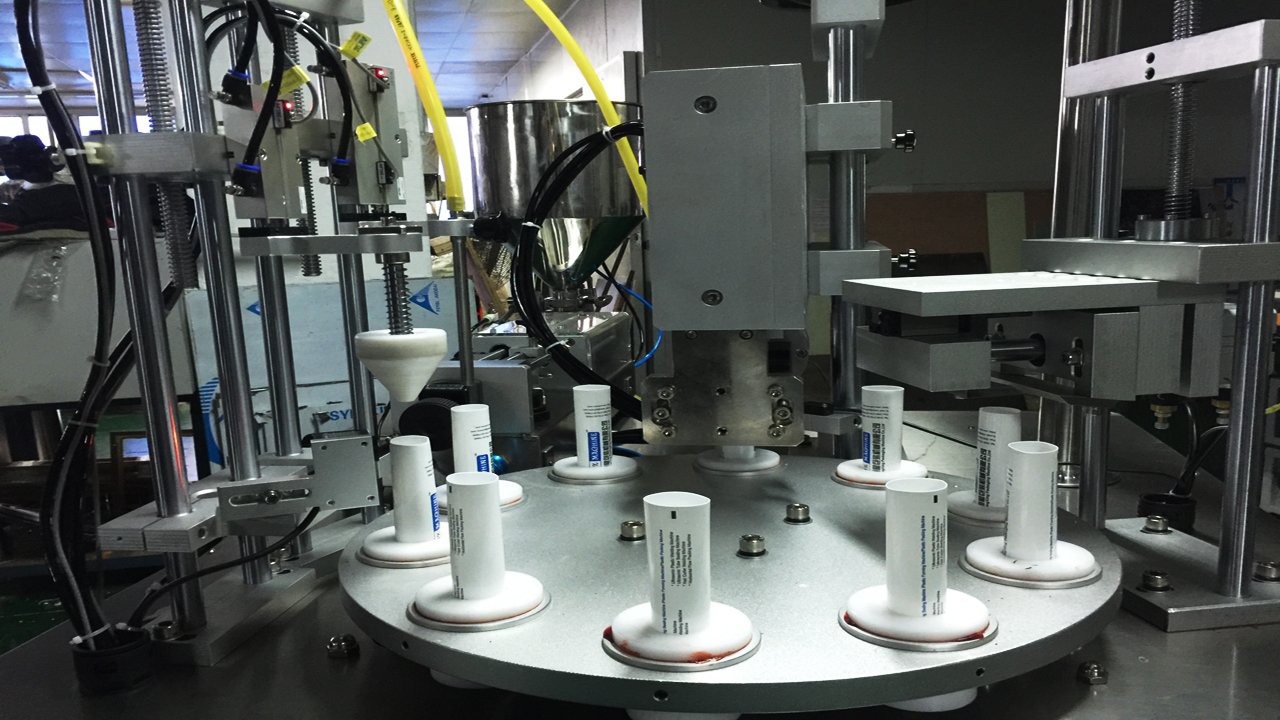 rotary filling sealing machine מילוי סיבובי צינורות קוליים איטום.jpg