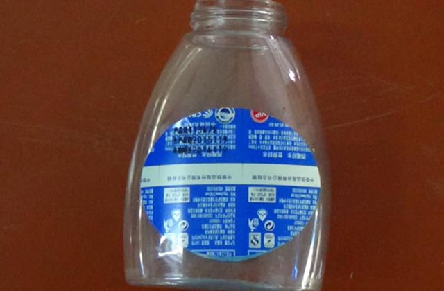 מכונת תיוג מתגלגל לבקבוקים שטוחים samples.jpg