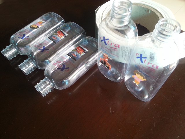 transparent labels labelled samples bottles plane surface מדגם מרוואן תוויות שקופות ובקבוקים (3).jpg