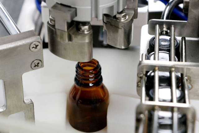 מכונת מילוי בקבוקי שמן tabletop.jpg